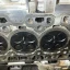 Cylinder head removed from the engine, showing the valves in all four combustion chambers